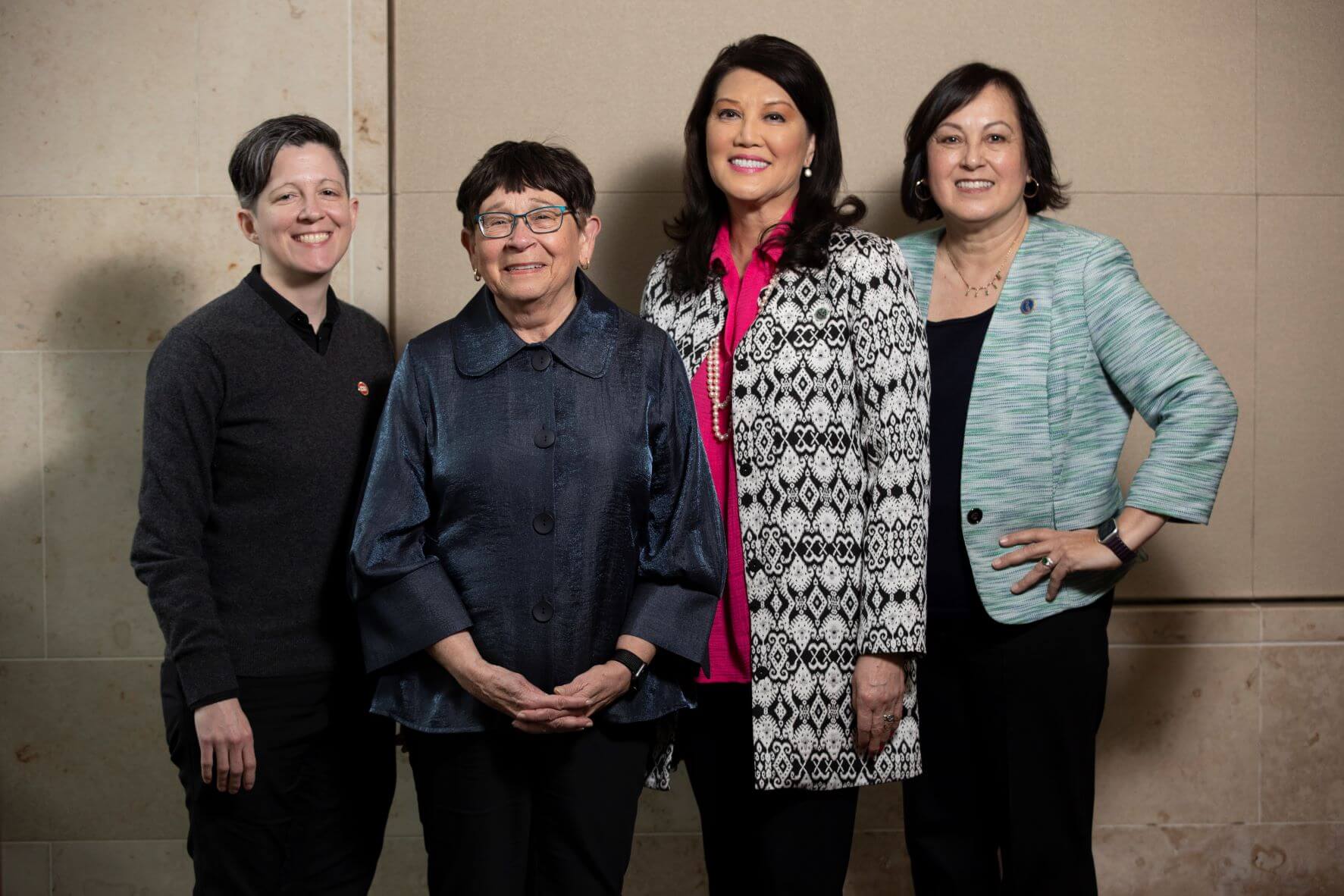 four smiling women