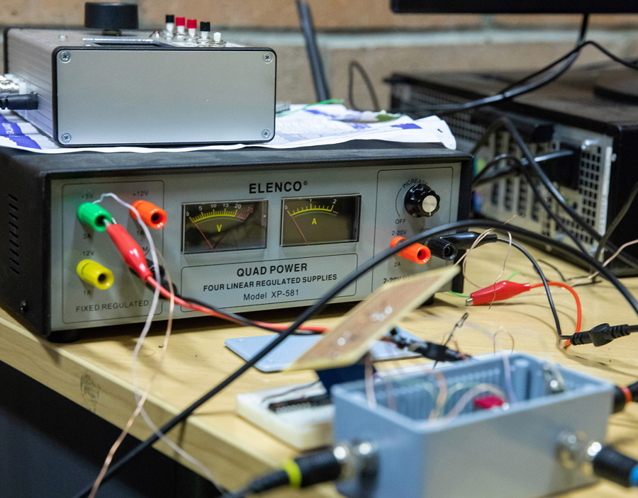 Power supply and circuitry that control a carbon dioxide laser used in combustion experiments.