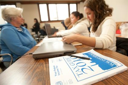 VITA students Toribio- Jenny Toribio, a senior accounting major, helps Kathy Verlinden with her income tax preparation as part of the Volunteer Income Tax Assistance program at the Pomona YMCA March 19, 2011.