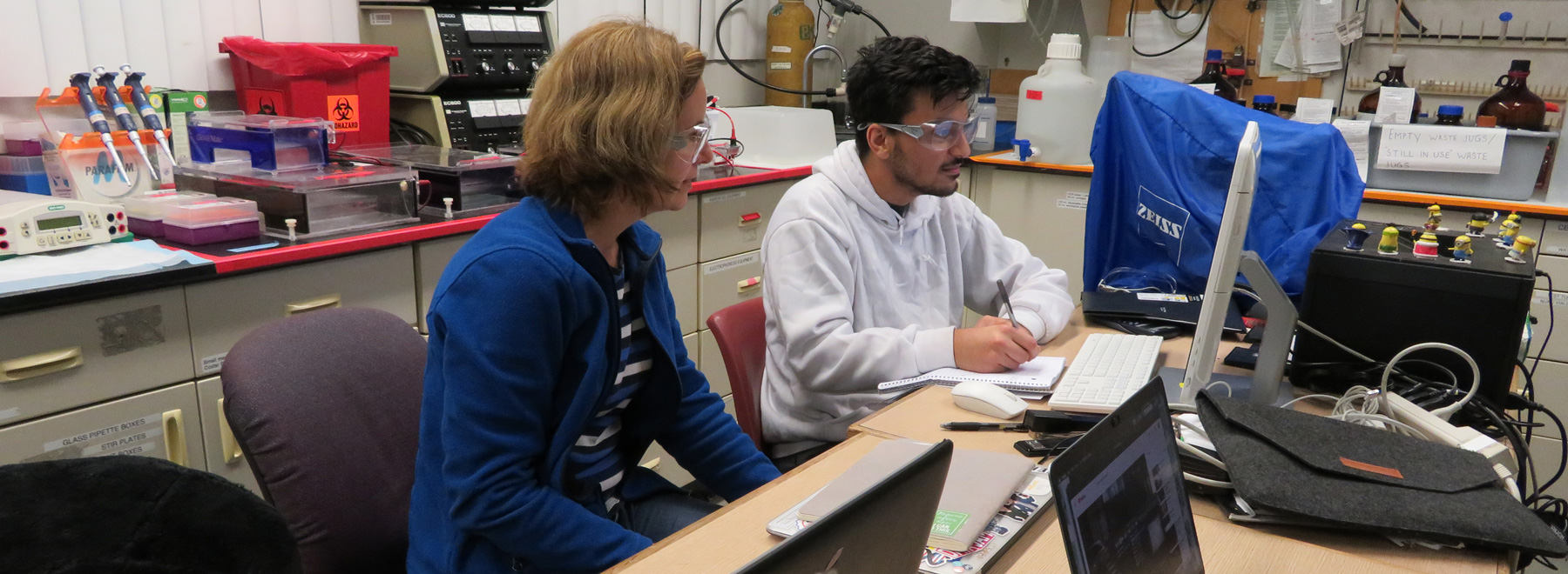 researchers working at a computer