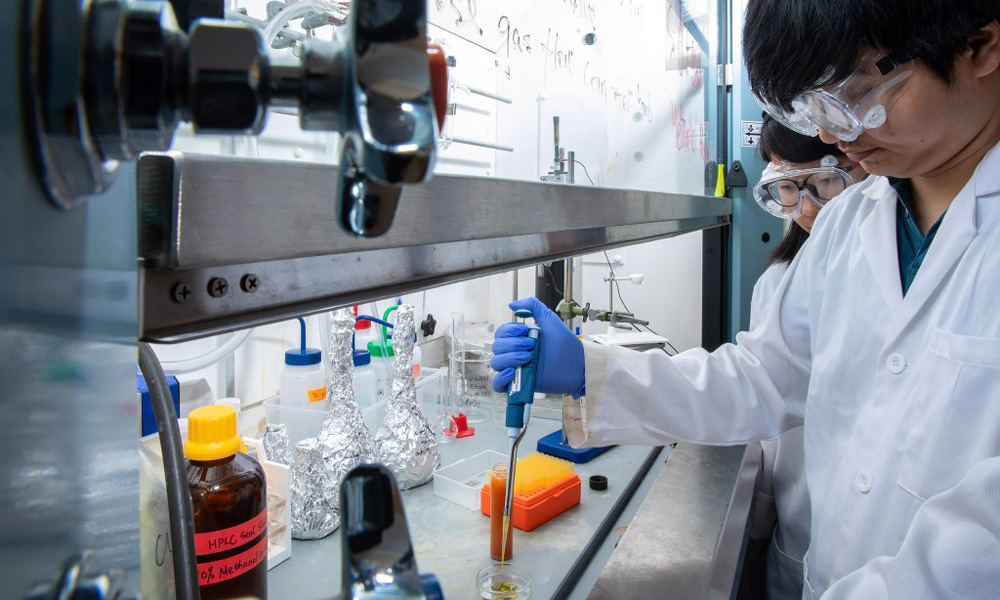 Dr. Fangyuan Tian working in a lab