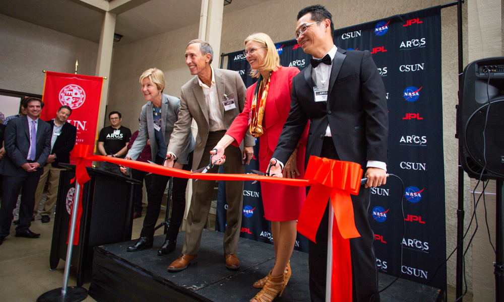 CSUN leaders cutting red ribbon