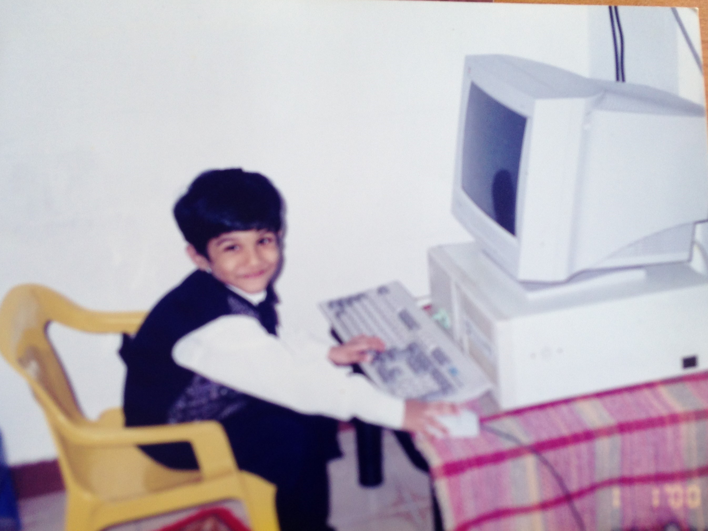 ​3-year-old Vikram Sai Kishan​ tinkering with a computer at his home.
