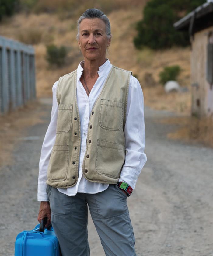 Karina holding a solar suitcase