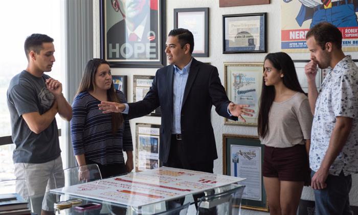 Robert talking with students
