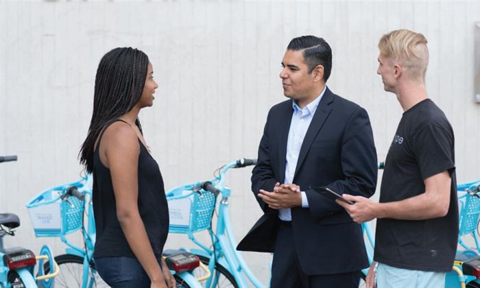 Robert talking with constituents